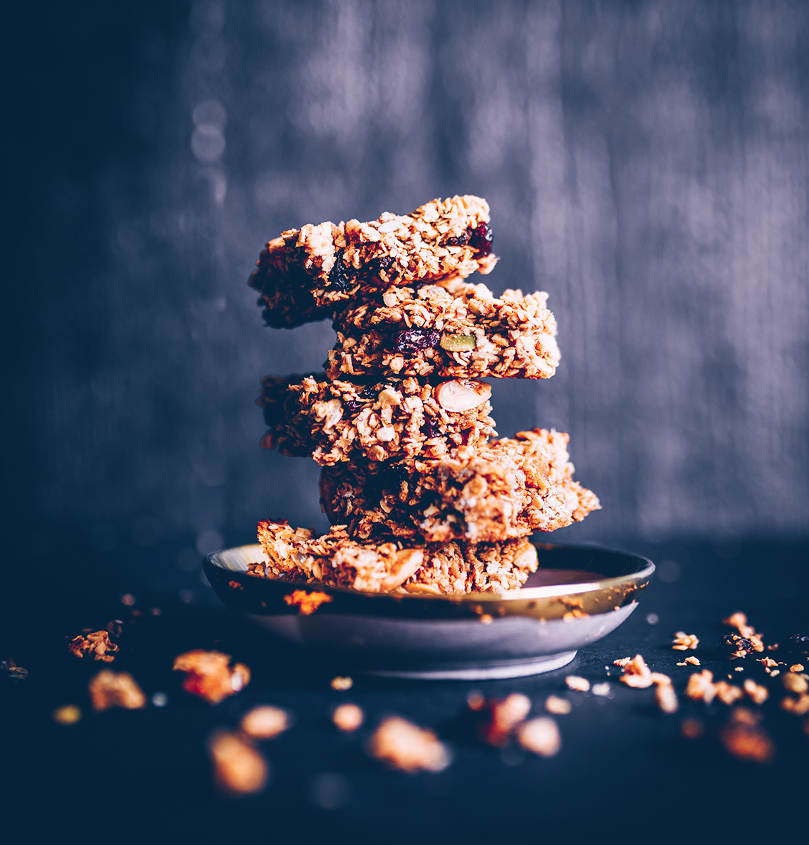A stack of protein bars made with oats, granola and fruit